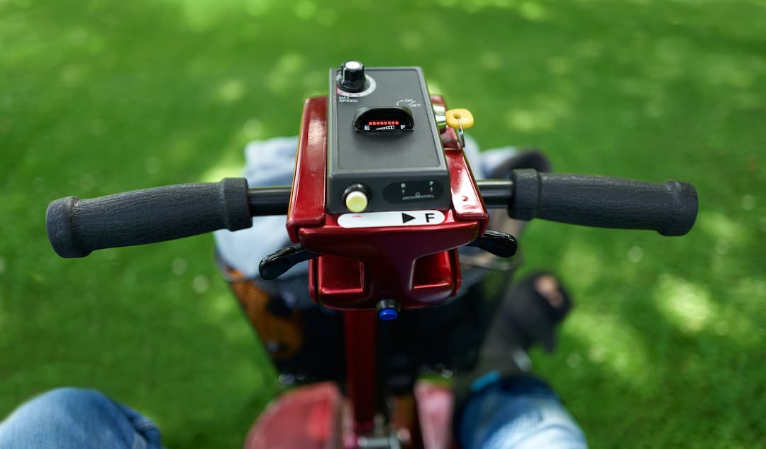 View from behind a mobility scooter's handlebar